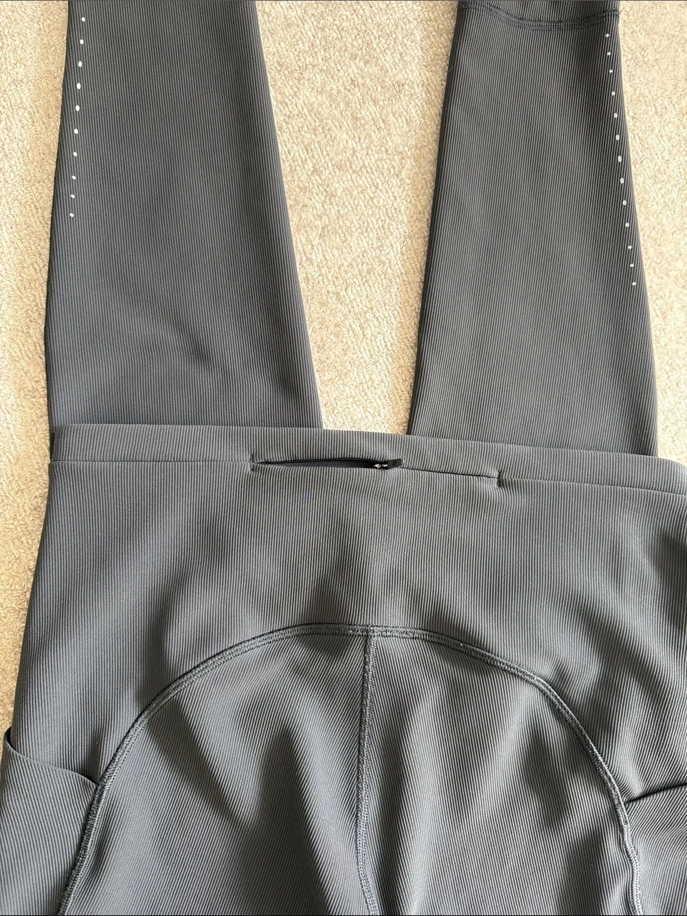 lululemon athletica leggings with pockets and subtle reflective dots